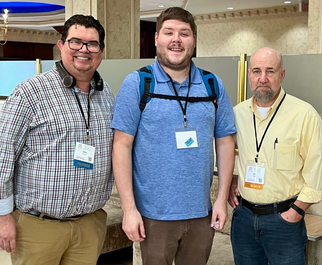 IDS Interim Executive Director Dr. Jerry Alliston, Self-Advocacy Coordinator Taylor Carley, and Director of Technology and Accessibility Rich Baker at the Megaconference.