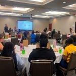 All conference attendees watching a presentation