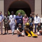 RISE Summer College Readiness Program students stand in front of Luckyday Hall on Southern Miss campus.